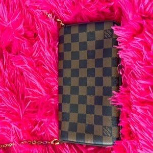 Félice pochette in the color monogram